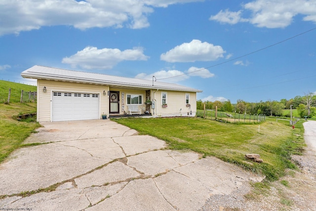 719 Elk Run Rd, Bruceton Mills, WV 26525 - view of front of home featuring concrete driveway, an attached garage, and metal roof