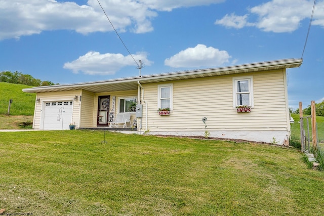 719 Elk Run Rd, Bruceton Mills, WV 26525 - back of property featuring an attached garage, a lawn, and covered porch