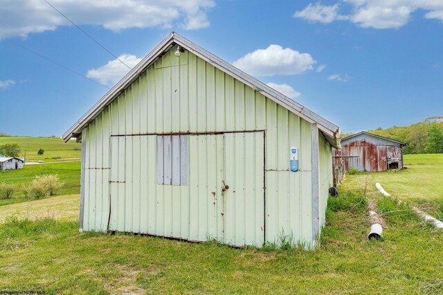 719 Elk Run Rd, Bruceton Mills, WV 26525 - view of pole building with a yard