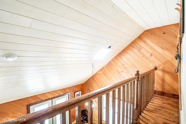 434 Cabin Mountain Rd, Davis, WV 26260 - hallway with wooden walls, an upstairs landing, lofted ceiling, and wood finished floors