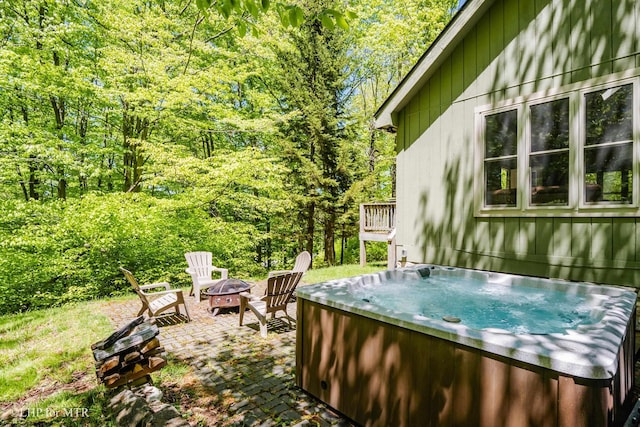434 Cabin Mountain Rd, Davis, WV 26260 - view of yard with a hot tub, a fire pit, a patio, and a wooded view