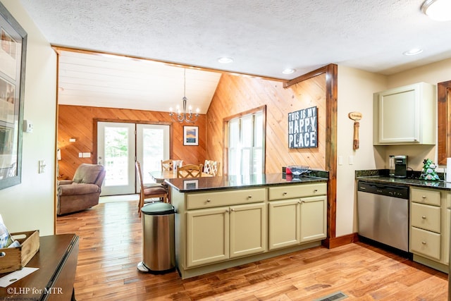434 Cabin Mountain Rd, Davis, WV 26260 - kitchen with dishwasher, a peninsula, wood walls, a chandelier, and a textured ceiling