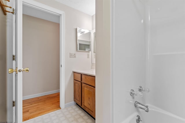 42 Ice Linn Ln, Fairmont, WV 26554 - bathroom featuring tile patterned floors, vanity,  shower combination, and baseboards