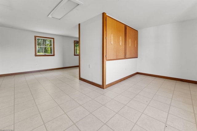42 Ice Linn Ln, Fairmont, WV 26554 - spare room featuring baseboards and attic access