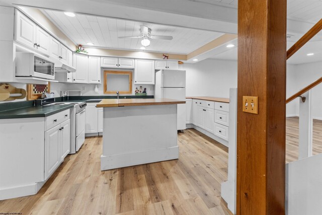 42 Ice Linn Ln, Fairmont, WV 26554 - kitchen with white appliances, white cabinetry, light wood-style floors, under cabinet range hood, and recessed lighting