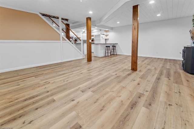 42 Ice Linn Ln, Fairmont, WV 26554 - finished below grade area featuring white refrigerator with ice dispenser, recessed lighting, wood finished floors, stairs, and baseboards