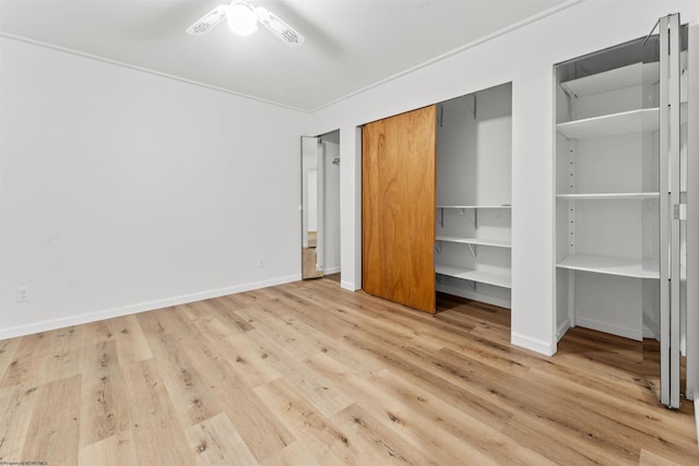 42 Ice Linn Ln, Fairmont, WV 26554 - unfurnished bedroom featuring wood finished floors, baseboards, and a closet