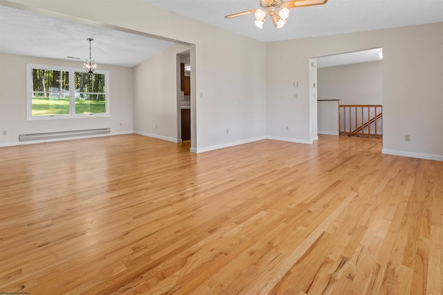 42 Ice Linn Ln, Fairmont, WV 26554 - spare room featuring a baseboard heating unit, a chandelier, light wood finished floors, a ceiling fan, and baseboards