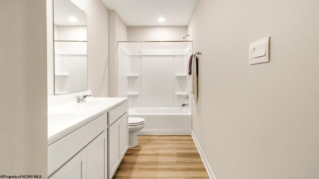 819 Bogey Ln, Maidsville, WV 26541 - full bathroom with wood finished floors, toilet, double vanity, shower / bath combination, and recessed lighting