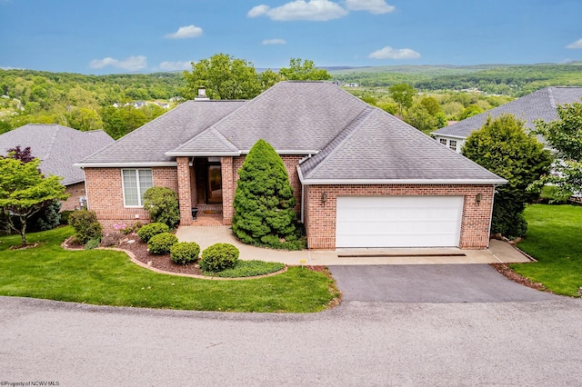 2022 Georgian Ln, Morgantown, WV 26508 - view of front of home with an attached garage, brick siding, asphalt driveway, and a front lawn