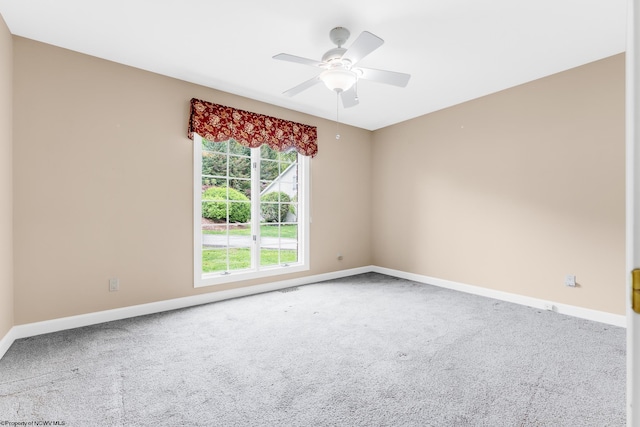 2022 Georgian Ln, Morgantown, WV 26508 - spare room featuring carpet, baseboards, and a ceiling fan