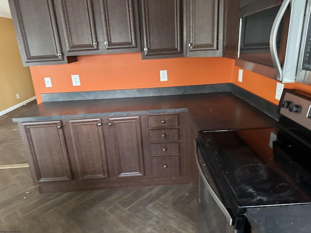 31 Sanctuary Ln, Worthington, WV 26591 - kitchen featuring stainless steel appliances, dark countertops, and dark brown cabinets