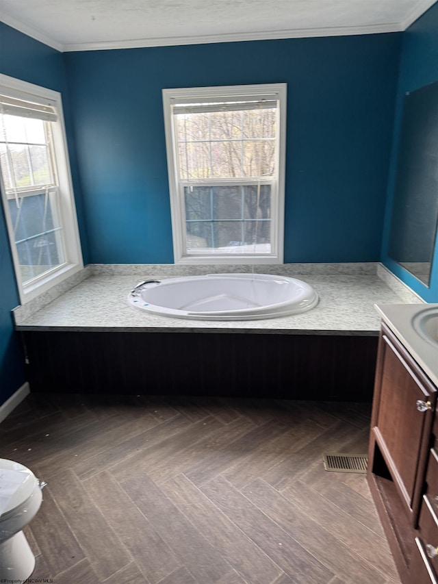 31 Sanctuary Ln, Worthington, WV 26591 - bathroom featuring vanity, a bath, crown molding, and toilet