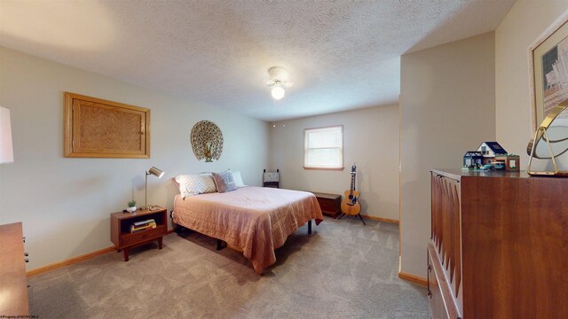 524 Kinney St, Bridgeport, WV 26554 - bedroom with light colored carpet, baseboards, and a textured ceiling