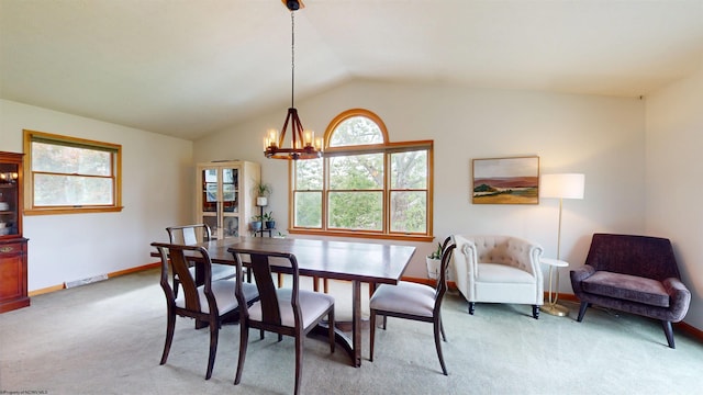 524 Kinney St, Bridgeport, WV 26554 - dining area with a chandelier, light carpet, vaulted ceiling, and baseboards