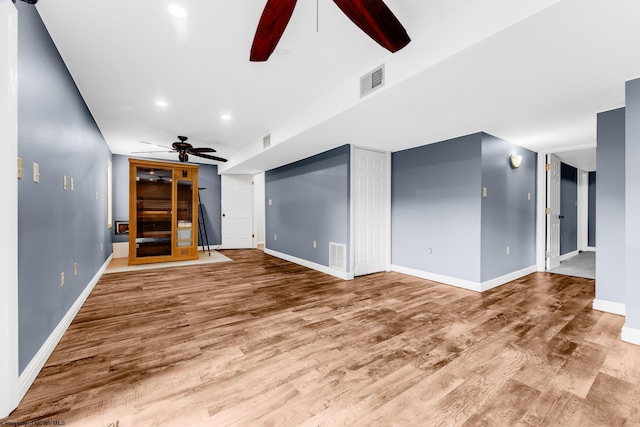 405 Lakeview Ests, Morgantown, WV 26508 - unfurnished living room featuring ceiling fan, baseboards, wood finished floors, and recessed lighting