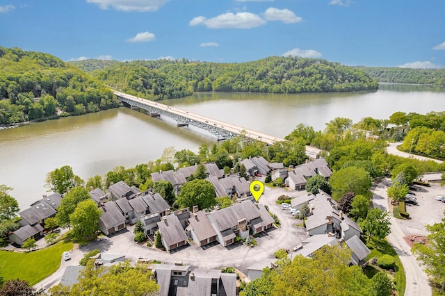 405 Lakeview Ests, Morgantown, WV 26508 - aerial perspective of suburban area with a heavily wooded area, a nearby body of water, and a notable bridge