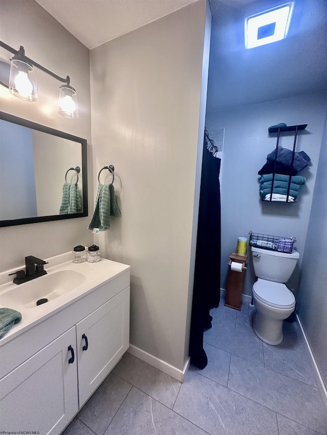 1829 Crooked Run Rd, Clarksburg, WV 26301 - full bathroom featuring baseboards, tile patterned floors, toilet, and vanity