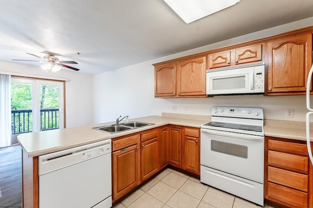 233 Creekside Dr Unit 3, Morgantown, WV 26508 - kitchen with white appliances, a sink, a peninsula, and light countertops