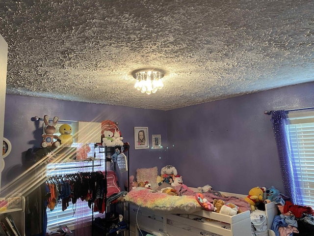151 Raintree Blvd, Bridgeport, WV 26330 - bedroom with a textured ceiling
