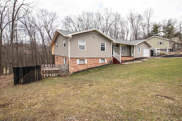 213 Forest Dr, Bridgeport, WV 26330 - back of property with a garage and brick siding