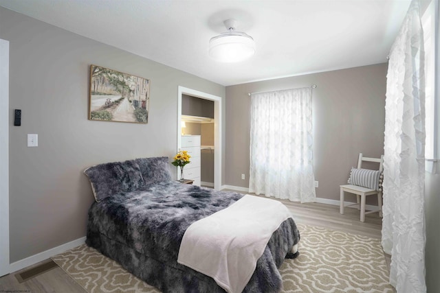 213 Forest Dr, Bridgeport, WV 26330 - bedroom featuring wood finished floors and baseboards