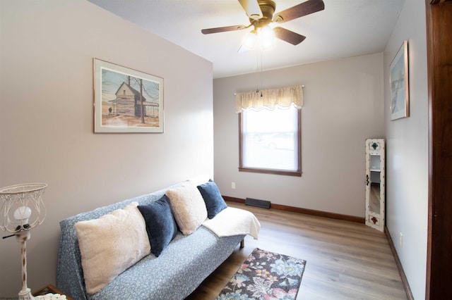 213 Forest Dr, Bridgeport, WV 26330 - sitting room featuring light wood-style floors, a ceiling fan, and baseboards