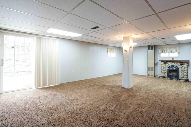 213 Forest Dr, Bridgeport, WV 26330 - below grade area with carpet, a fireplace, healthy amount of natural light, and a drop ceiling