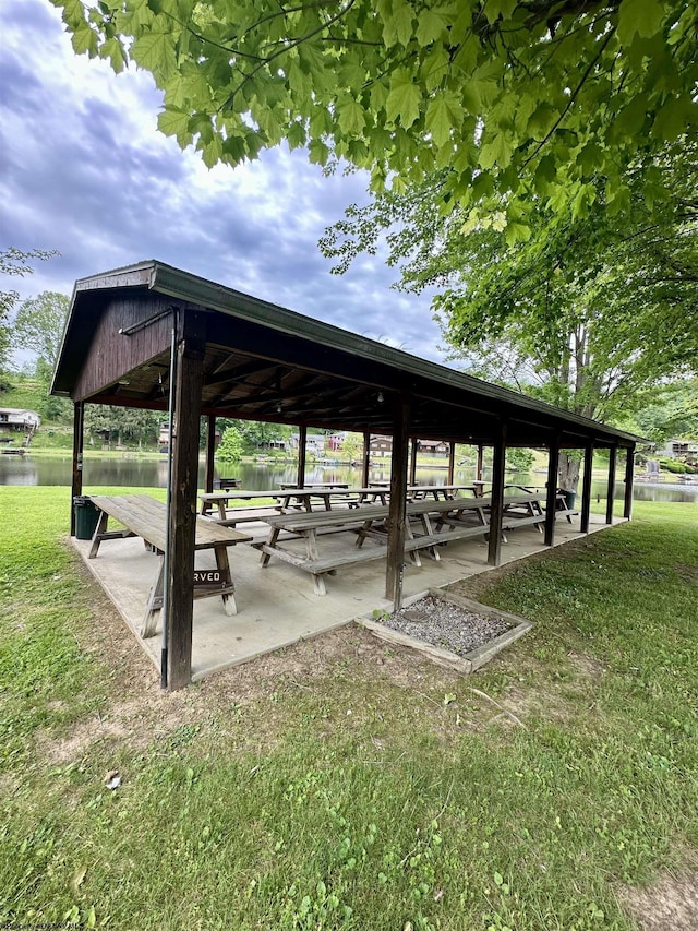 1322 Crystal Lake Rd, West Union, WV 26456 - view of home's community with a water view, a lawn, and a patio area