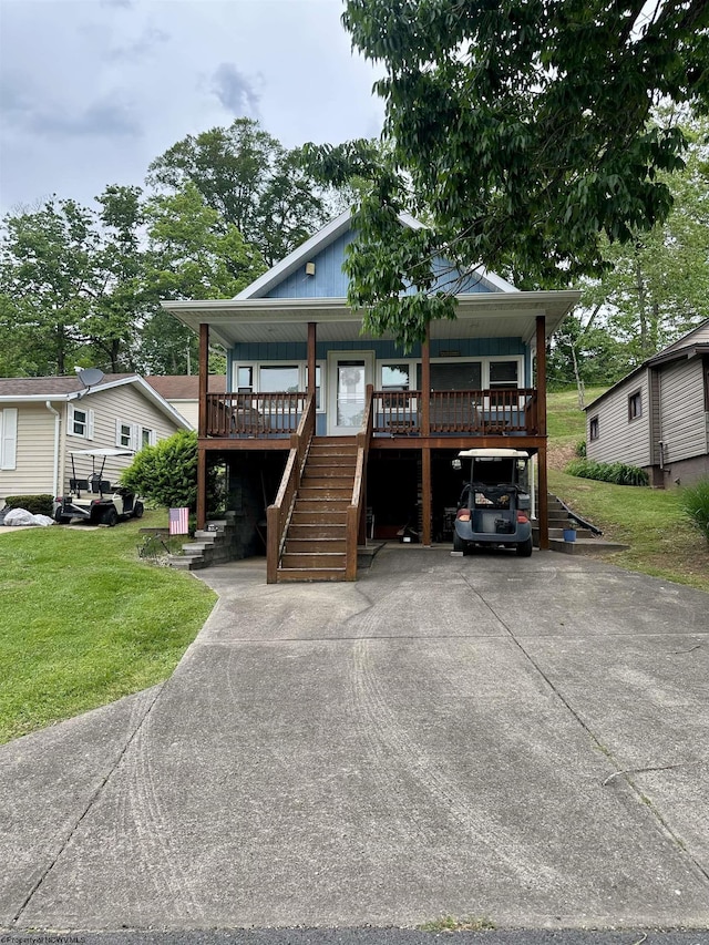 1322 Crystal Lake Rd, West Union, WV 26456 - view of front facade featuring a porch, stairway, a front lawn, and concrete driveway