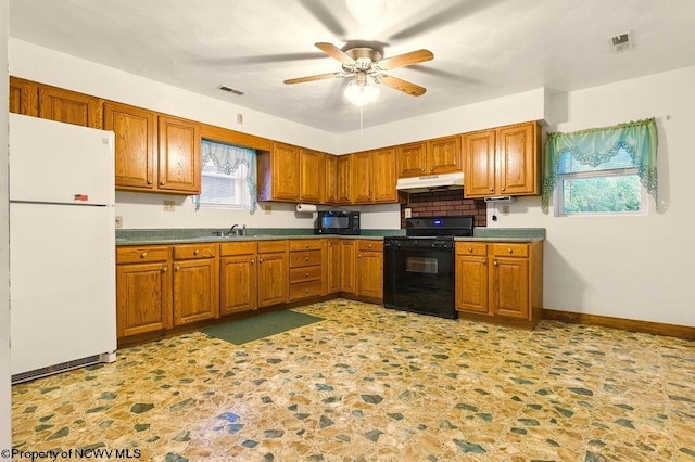 737 Summit Park Ave, Clarksburg, WV 26301 - kitchen with black appliances, under cabinet range hood, brown cabinetry, and ceiling fan