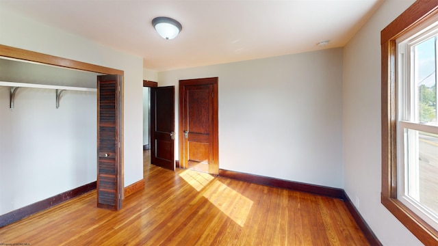 505 State St, Fairmont, WV 26554 - unfurnished bedroom with light wood-style floors, baseboards, and a closet