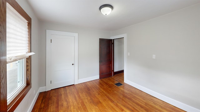 505 State St, Fairmont, WV 26554 - unfurnished bedroom featuring light wood finished floors, baseboards, and a closet