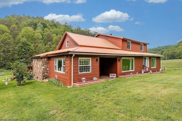 595 States Fork Rd, Metz, WV 26585 - back of house with a yard and metal roof