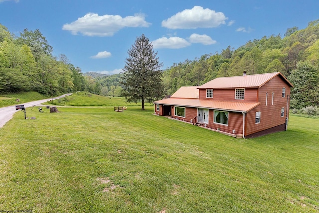 595 States Fork Rd, Metz, WV 26585 - view of green lawn with a forest view