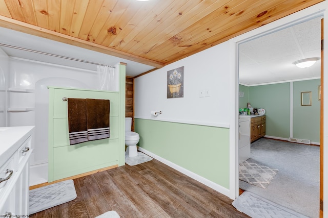 595 States Fork Rd, Metz, WV 26585 - full bath featuring vanity, toilet, baseboards, and washer / dryer