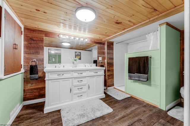 595 States Fork Rd, Metz, WV 26585 - bathroom with double vanity, wooden ceiling, wood finished floors, wood walls, and baseboards