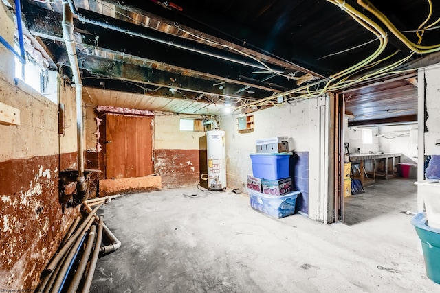 595 States Fork Rd, Metz, WV 26585 - below grade area with water heater and healthy amount of natural light