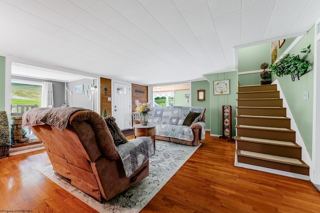 595 States Fork Rd, Metz, WV 26585 - living area with wood finished floors and stairs