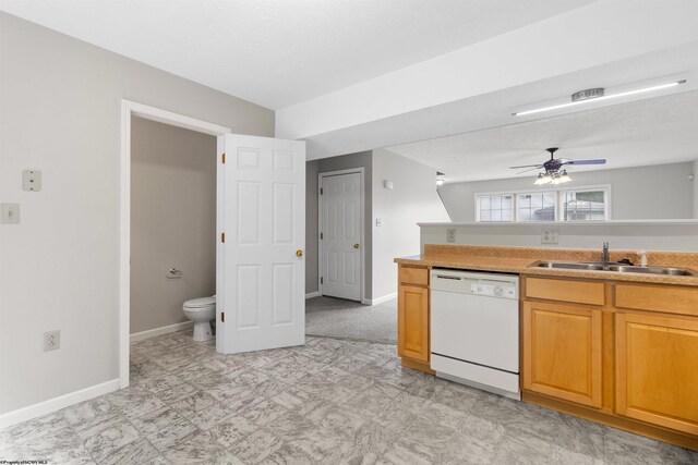 10 Pineview Pl, Morgantown, WV 26505 - kitchen featuring dishwasher, a sink, a ceiling fan, baseboards, and light countertops