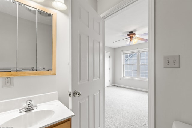 10 Pineview Pl, Morgantown, WV 26505 - bathroom featuring vanity, a ceiling fan, toilet, and baseboards