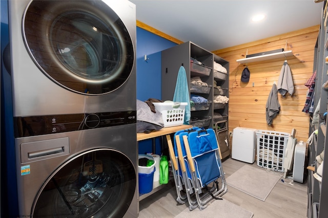1 Ginger Ct, Terra Alta, WV 26764 - washroom with stacked washer / drying machine, wooden walls, and wood finished floors