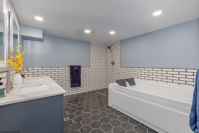 1 Ginger Ct, Terra Alta, WV 26764 - full bath featuring double vanity, tile walls, a garden tub, recessed lighting, and tile patterned flooring