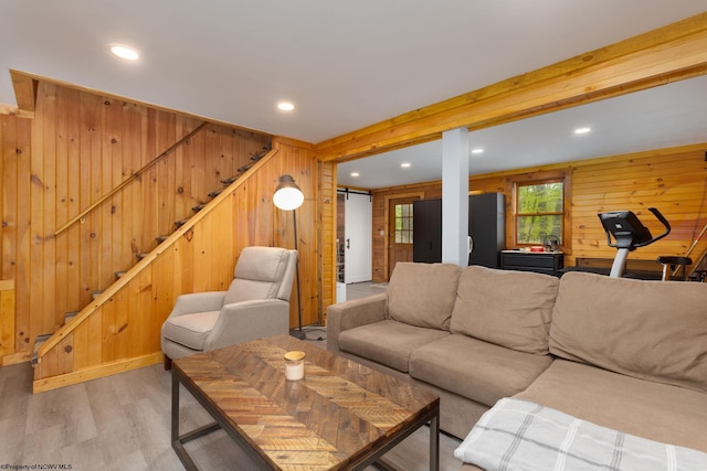 1 Ginger Ct, Terra Alta, WV 26764 - living room with wood walls, stairs, light wood-type flooring, recessed lighting, and a barn door