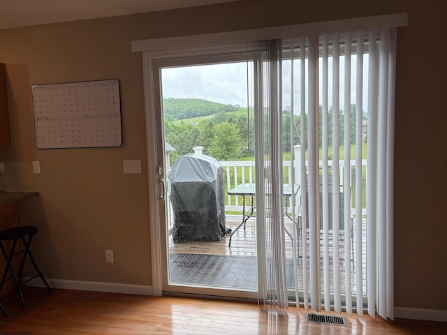 501 Santa Fe Ct, Morgantown, WV 26508 - doorway to outside featuring baseboards and wood finished floors