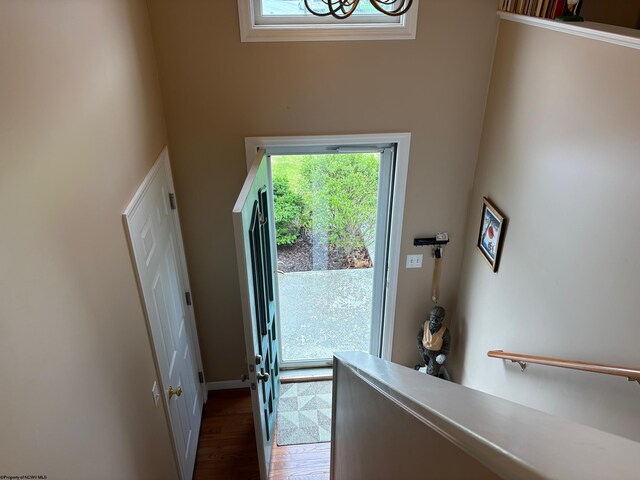 501 Santa Fe Ct, Morgantown, WV 26508 - doorway with wood finished floors, a towering ceiling, a chandelier, and baseboards