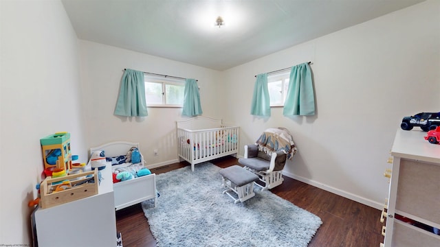 1601 Green Gables Rd, Fairmont, WV 26554 - bedroom featuring a crib, wood finished floors, and baseboards