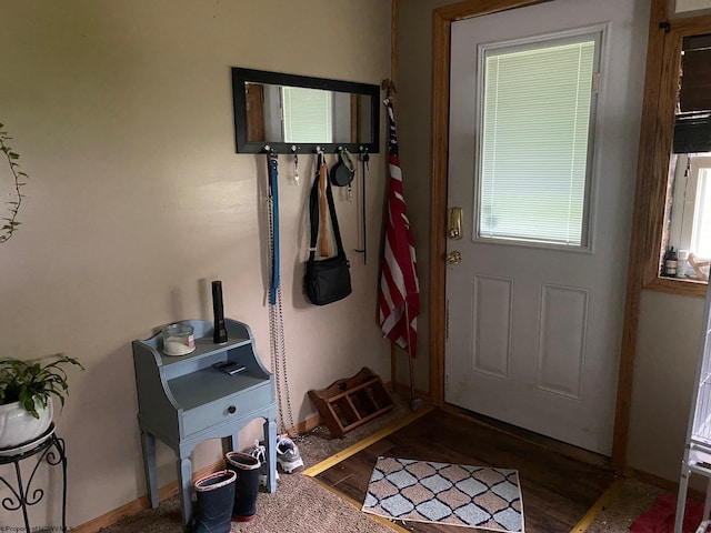 21434 Seneca Trl, Valley Head, WV 26294 - doorway to outside featuring baseboards and wood finished floors