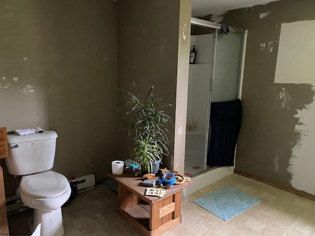 21434 Seneca Trl, Valley Head, WV 26294 - bathroom with tile patterned floors, toilet, a shower stall, and a baseboard heating unit