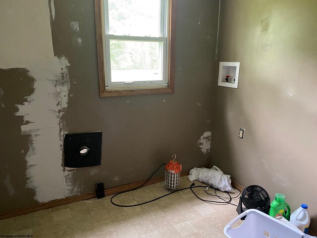 21434 Seneca Trl, Valley Head, WV 26294 - washroom featuring hookup for a washing machine and tile patterned floors